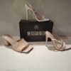 30 X BRAND NEW MIXED MISSGUIDED SHOES CONTAINING ASSYM STRAPPY HIGH HEEL SANDALS IN WHITE , POINTED TOE PATENT BARELY THERE IN NUDE , SQUARE TOE BLOCK HEEL MULE SANDALS ETC ALL IN SIZE 4