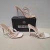 30 X BRAND NEW MIXED MISSGUIDED SHOES CONTAINING EXTREME PLATFORM SATIN HEELED SANDALS IN BLACK , POINTED TOE PATENT BARELY THERE IN NUDE , ASSYM STRAPPY HIGH HEEL SANDALS IN WHITE ETC ALL IN SIZE 7