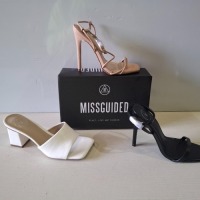 30 X BRAND NEW MIXED MISSGUIDED SHOES CONTAINING WF BARELY THRE SQUARE TOE HIGH HEELS IN WHITE , ASSYM STRAPPY HIGH HEEL SANDALS IN WHITE , BASIC BARELY THERE IN BLACK ETC ALL IN SIZE 4