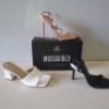 30 X BRAND NEW MIXED MISSGUIDED SHOES CONTAINING WF BARELY THRE SQUARE TOE HIGH HEELS IN WHITE , ASSYM STRAPPY HIGH HEEL SANDALS IN WHITE , BASIC BARELY THERE IN BLACK ETC ALL IN SIZE 4