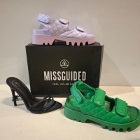 20 X BRAND NEW MIXED MISSGUIDED SHOES CONTAINING QUILTED GRANDAD SANDAL IN LILAC , WF SATIN POINTED LACE UP BARELY THERE IN BLACK ETC ALL IN SIZE 7