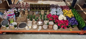 FULL BAY OF BRAND NEW PREMIER LOT CONTAINING SQUIRREL ORNAMENT , 4 - 1 LED SOLAR POWERED FLICKERING FLAME TORCHES , SQUARE COLUMN OIL BURNER , MUSHROOM ORAMENT , THE OUTDOOR LIVING CITRONELLA CANDLES , VARIOUS ARTIFICIAL DECORATIVE PLANTS ETC ON A FULL BA