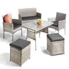 1 X STUDIO FIJI DINING SET IN GREY TO INCLUDE 1 LOVESEAT , 2 ARM CHAIRS , 2 FOOT STOOLS , AND 1 GLASS TOP TABLE - COMES IN ONE BOX AND PRE - BUILT TABLE