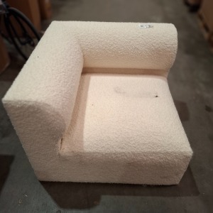 1X FLUFFY CORNER CHAIR IN CREAM (NOTE MARK ON CHAIR)