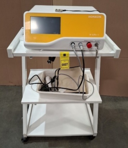 1 X HONKON V - LIFT MACHINE FOR WRINKLE SMOOTHING , SKIN RE JUVENATION , SKIN LIFTING AND TIGHTENING - ORIG RRP &pound;2899 - SN BD22900194G - COMES WITH ROLLING METAL TABLE.