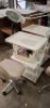 8 X MIXED LOT CONTAINING 5 METAL ON WHEELS TABLES WITH LED MAGNIFYING ATTACHMENTS AND 3 SPINNING STOOLS - 2