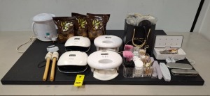 MIXED AMOUNT OF SALON BEAUTY EQUIPMENT LOT CONTAINING SUNUV LED NAIL LAMPS , OPL LG INOTEK LED NAIL LAMO DRYERS , WAX HEATER WARMER MACHINE , NAIL BUFFERS , PACKS OF OUTBACK GOLD PEELABLE WAX ETC
