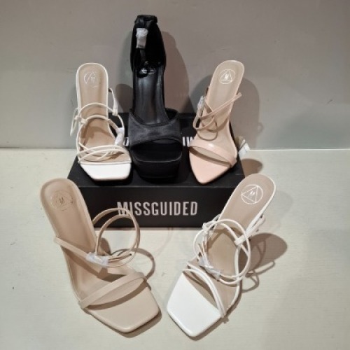 30 X BRAND NEW PAIRS OF MIXED MISSGUIDED SHOES CONTAINING EXTREME PLATFORM SATIN HEELED SANDALS IN BLACK , POINTED TOE PATENT BARELY THERE IN NUDE , ASSYM STRAPPY HIGH HEEL SANDALS IN WHITE ETC ALL IN SIZE 7