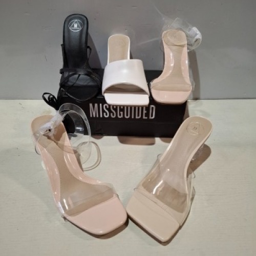 30 X BRAND NEW PAIRS OF MIXED MISSGUIDED SHOES CONTAINING ASSYM STRAPPY HIGH HEEL SANDALS IN NUDE , BASIC BARELY THERE IN BLACK , WF BARELY THERE SQUARE TOE HIGH HEELS IN WHITE ETC ALL IN SIZE WHITE ETC ALL IN SIZE 5