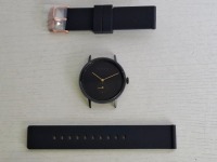 9 X BRAND NEW KANSKE STAINLESS STEEL WATCH IN COLOUR BLACK WITH 10 BLACK RUBBER STRAPS (NOTE NO STRAP SPRING BARS )