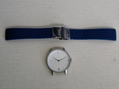 10 X BRAND NEW KANSKE STAINLESS STEEL WATCH IN COLOUR SILVER WITH 10 NAVY BLUE RUBBER STRAPS (NOTE NO STRAP SPRING BARS )