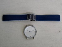 10 X BRAND NEW KANSKE STAINLESS STEEL WATCH IN COLOUR SILVER WITH 10 NAVY BLUE RUBBER STRAPS (NOTE NO STRAP SPRING BARS )