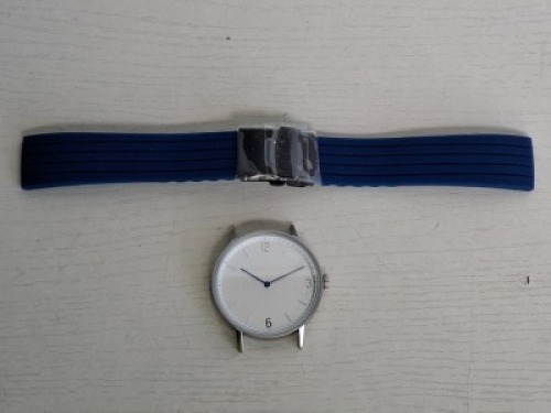 10 X BRAND NEW KANSKE STAINLESS STEEL WATCH IN COLOUR SILVER WITH 10 NAVY BLUE RUBBER STRAPS (NOTE NO STRAP SPRING BARS )