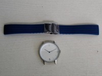 10 X BRAND NEW KANSKE STAINLESS STEEL WATCH IN COLOUR SILVER WITH 10 NAVY BLUE RUBBER STRAPS (NOTE NO STRAP SPRING BARS )