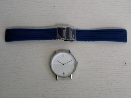 10 X BRAND NEW KANSKE STAINLESS STEEL WATCH IN COLOUR SILVER WITH 10 NAVY BLUE RUBBER STRAPS (NOTE NO STRAP SPRING BARS )
