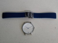 10 X BRAND NEW KANSKE STAINLESS STEEL WATCH IN COLOUR SILVER WITH 10 NAVY BLUE RUBBER STRAPS (NOTE NO STRAP SPRING BARS )