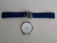 10 X BRAND NEW KANSKE STAINLESS STEEL WATCH IN COLOUR SILVER WITH 10 NAVY BLUE RUBBER STRAPS (NOTE NO STRAP SPRING BARS )