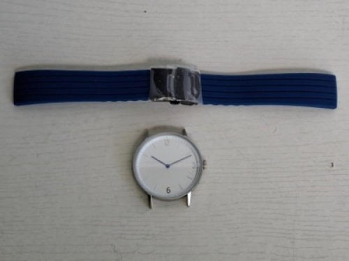 10 X BRAND NEW KANSKE STAINLESS STEEL WATCH IN COLOUR SILVER WITH 10 NAVY BLUE RUBBER STRAPS (NOTE NO STRAP SPRING BARS )