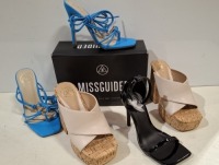 30 X BRAND NEW PAIRS OF MIXED MISSGUIDED SHOES CONTAINING STRAPPY RING DETAIL HEELED SANDAL IN BLUE , SQUARE TOE PATENT HEELED SANDAL IN BLACK , EXTREME PLATFORM CORK HEELED MULES IN CREAM ETC ALL IN SIZE 3