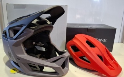 2 X PIECE BRAND NEW BIKE HELMET LOT CONTAINING 1 X FOX PROFRAME MOUTAIN BIKE HELMET IN SIZE CLYZO SMOKE GREY SIZE LARGE - RRP &pound; 215 - 1 X FOX RACING YOUTH MAINFRAME MTB HELMET IN FLO RED - RRP &pound;60 - TOTAL FOR LOT &pound;275