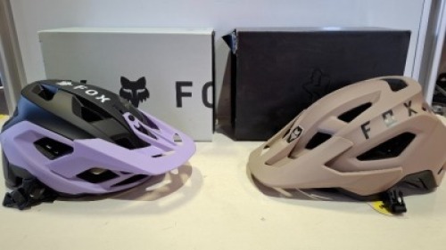 2 X PIECE BRAND NEW BIKE HELMET LOT CONTAINING 1 X FOX SPEEDFRAME SOLID HELMET IN PURPLE / BLACK IN SIZE LARGE - RRP &pound;105 - 1 X FOX SPEEDFRAME SOLID HELMET IN LIGHT BROWN IN SIZE LARGE - RRP &pound;105 - TOTAL RRP FOR LOT &pound;210