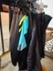 12 X BRAND NEW MIXED CLOTHING LOT CONTAINING FOX JEANS IN SIZE 32 , MADISON JACKET IN BLACK / GREEN IN SIZE 8 , MADISON ROAM MEN'S DWR CARGO BIB TIGHTS IN BLACK IN SIZE XL , VARIOUS MADISON / FOX SHORTS IN BLACK / GREY IN SIZE 8 , SMALL , 30 , 28 ETC - 2