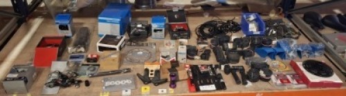 FULL BAY OF MIXED BIKE PARTS / ACCESSORIES LOT CONTAINING SRAM RIVAL 1 REAR DERAILLEUR , SRAM FORCE AM RD FORCE ETAP AXS D1 , CLARKS REAR CASSETTE MTB 12 SPEED , SHIMANO REAR DERAILLEUR , VARIOUS INNER TUBES AND BIKE CHAINS ETC