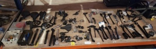 FULL BAY OF MIXED BIKE PARTS / ACCESSORIES LOT CONTAINING VARIOUS BICYCLE KICKSTANDS , ROAD BIKE REAR DERAILLEURS , BICYCLE SEATS , ETC