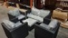 1 X RATTAN GARDEN SET IN GREY TO INCLUDE TWO-SEATER SOFA , 3 ARM CHAIRS , 1 FOOTSTOOL ( PRE BUILT )