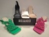 32 X PAIRS OF BRAND NEW MISSGUIDED MIXED SHOE LOT CONTAINING CROCHET TIE UP HEELED SANDALS IN GREEN , SQUARE TOE HIGH HEEL TIE UP SANDALS IN SAND , HIGH HEEL BLOCK BARELY THERE SANDALS IN WHITE ALL IN SIZE 6 ETC ON HALF A BAY