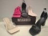 32 X PAIRS OF BRAND NEW MISSGUIDED MIXED SHOE LOT CONTAINING MID CLEAR HEEL BLOCK HEEL IN NUDE , PERSPEX BLOCK HEEL MULE SANDAL IN SAND , ENTRY BLOCK HEEL SANDAL IN BLACK ALL IN SIZE 6 ETC ON HALF A BAY