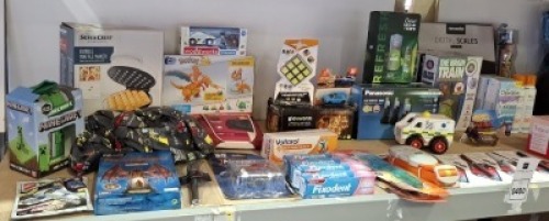 70 PC NEW MIXED LOT TO INCLUDE GOODMANS SPEAKER - WIRELESS EAR BUDS - PANASONIC ANSWERING SYSTEM - BUBBLE WAFFLE MAKER - LOREAL REVITALIFT - LOREAL MOISTURISER - RIMMEL LONDON FOUNDATION - DOVE TAN LOTION - MODA DIGITAL SCALES - POKEMON TOY - HOT WHEELS T