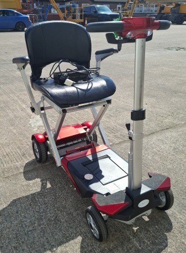 NEXT GEN AUTO PLUS FOLDABLE MOBILITY SCOOTER IN RED WITH BATTERY & CHARGER RRP &pound;2995 CONDITION: VERY GOOD (TESTED WORKING & SEE ALL IMAGES FOR CONDITION)
