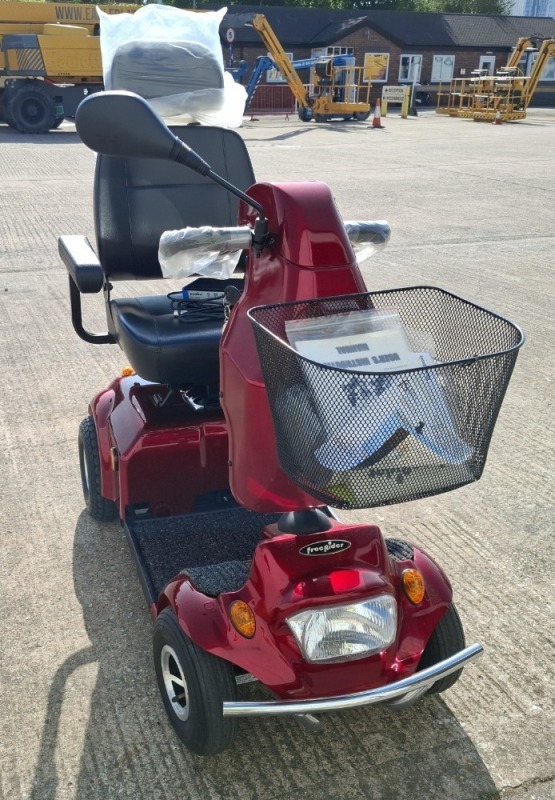 FREERIDER CITY RANGER MOBILITY SCOOTER IN RED WITH BATTERY & CHARGER ORIG RRP &pound;4995 28 MILE RANGE - MAX SPEED 6 MPH CONDITION - AS NEW (TESTED WORKING & SEE ALL IMAGES FOR CONDITION)