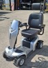 KYMCO UK KOMFY 4 MOBILITY SCOOTER IN SILVER (MODEL: EQ30FA(UK) ) WITH BATTERY & CHARGER 25 MILES RANGE - MAX SPEED 4 MPH CONDITION: GOOD (TESTED WORKING & SEE ALL IMAGES FOR CONDITION) - 2