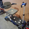 2 X DRIVE DEVILBISS MANUAL FOLDING SCOOTERS - RED & BLUE BOTH WITH KEYS & BATTERIES NO CHARGER IGNITION POWERS UP ON BOTH DRIVE DOES NOT ENGAGE CONDITION OF BOTH: FAIR - 3