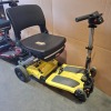 2 X FREERIDER LUGGIE FOLDING SCOOTERS - YELLOW & RED 1 BATTERY ONLY (RED MODEL) NO CHARGER IGNITION POWERS UP ON BOTH DRIVE DOES NOT ENGAGE CONDITION OF BOTH: FAIR - 2