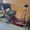 2 X FREERIDER LUGGIE FOLDING SCOOTERS - YELLOW & RED 1 BATTERY ONLY (RED MODEL) NO CHARGER IGNITION POWERS UP ON BOTH DRIVE DOES NOT ENGAGE CONDITION OF BOTH: FAIR - 3