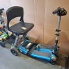 2 X FREERIDER LUGGIE ELITE DELUXE FOLDING SCOOTERS - BLUE & YELLOW 1 BATTERY ONLY (BLUE MODEL) NO CHARGER IGNITION POWERS UP ON BOTH DRIVE DOES NOT ENGAGE CONDITION OF BOTH: FAIR - 3