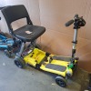 2 X FREERIDER LUGGIE FOLDING SCOOTERS - BLUE & YELLOW NO BATTERIES OR CHARGERS - 2