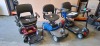 3 X MOBILITY SCOOTERS IE. 1 X DRIVE DEVILBISS CMS001RD CAR BOOT MODEL IN RED WITH KEY & BATTERY, NO CHARGER IGNITION POWERS UP BUT DRIVE DOES NOT ENGAGE 1 X FREERIDER LUGGIE POWER CHAIR IN RED WITH BATTERY, NO CHARGER IGNITION POWERS UP BUT DRIVE DOES NOT