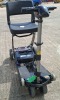 FREERIDER LUGGIE ELITE FOLDING MOBILITY SCOOTER IN BLACK NO CHARGER - TESTED WORKING WITH CHARGE REMAINING IN BATTERY CONDITION: GOOD