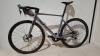SCOTT ADDICT RC 15 ROAD BIKE IN GREY CODE: 290358 SIZE: M ORIG RRP &pound;6199 (+ PREMIUM FOR ADDITIONAL ENG WORK) ADDICT RC DISC HMX CARBON FRAME ADDICT RC HMX FORK SHIMANO ULTEGRA DI2 DISC 24 SPEED SCHWALBE ONE RACE-GUARD TYRES STEERERS HAVE BEEN CUT OUT (STA - 2