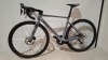 SCOTT ADDICT RC 15 ROAD BIKE IN GREY CODE: 290358 SIZE: L ORIG RRP &pound;6199 (+ PREMIUM FOR ADDITIONAL ENG WORK) ADDICT RC DISC HMX CARBON FRAME ADDICT RC HMX FORK SHIMANO ULTEGRA DI2 DISC 24 SPEED SCHWALBE ONE RACE-GUARD TYRES STEERERS HAVE BEEN CUT OUT (STA - 2