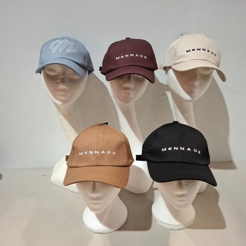 60 X BRAND NEW MENNACE LOGO BASEBALL CAPS IN VARIOUS COLOURS BLUE , BROWN , BLACK , OFF WHITE AND MAUVE IN TWO TRAYS