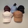 60 X BRAND NEW MENNACE LOGO BASEBALL CAPS IN VARIOUS COLOURS BLUE , BROWN , BLACK , OFF WHITE AND MAUVE IN TWO TRAYS - 2