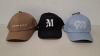60 X BRAND NEW MENNACE LOGO BASEBALL CAPS IN VARIOUS COLOURS BLUE , BROWN , BLACK AND MAUVE AND MAUVE IN TWO TRAYS - 2