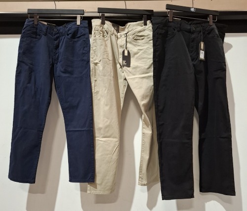 23 X BRAND NEW DUCK AND COVER JEANS IN VARIOUS COLOURS BLACK , NAVY BLUE , GREY , STONE ETC IN VARIOUS SIZES 32 , 38 , 34 , 36 , 30 ETC