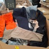 400+ BRAND NEW MIXED CLOTHING CONTAINING CRIMANAL DAMAGE PANTS WITH ZIP DETAIL IN DARK GREY SIZE 10, CRIMANAL DAMAGE JEANS IN NUDE IN SIZE 32, SPASE CORD PANTS IN BLACK SIZE 28, CRIMANAL DAMAGE CARGO PANTS IN ORANGE IN SIZE 28 ETC IN ONE PALLET BOX