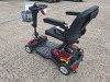 GENIUS AS TRAVELLER MOBILITY SCOOTER IN RED / BLACK WITH BATTERY & CHARGER 12 MILE RANGE - MAX SPEED 4/6 MPH RRP &pound; 1,695 CONDITION - GOOD (TESTED WORKING & SEE ALL IMAGES FOR CONDITION ) - 3